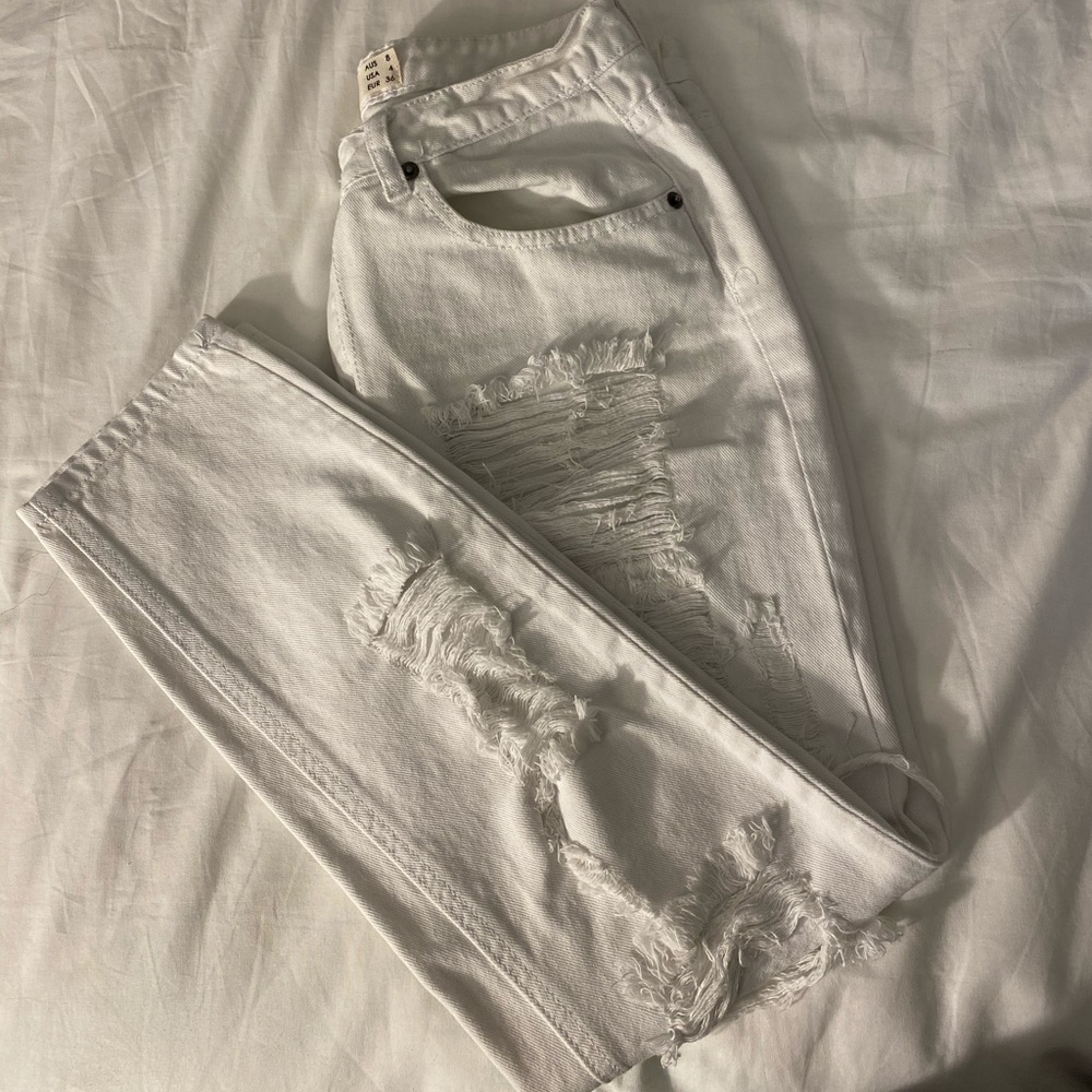 White ripped jeans